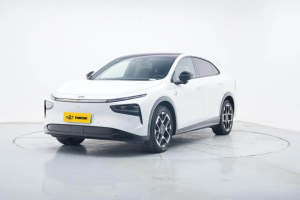 White Xpeng G7 all-electric coupe SUV three-quarter front shot on clean reflective studio floor for vehicle listing