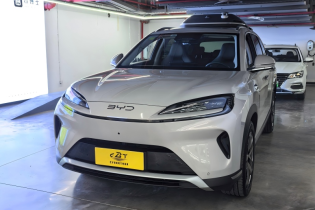 Gloss silver BYD EV crossover featuring streamlined LED headlights and closed electric front grille
