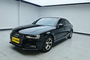 Sleek black Audi sedan: iconic quattro styling, refined performance, premium interior. Ideal for business commutes & stylish daily driving.