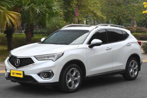 Elegant white Acura SUV: sleek design, reliable performance, ideal for urban commutes & weekend adventures. Premium comfort meets modern driving.